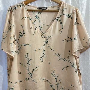 Express top with flower pattern